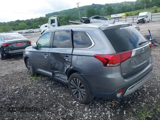 2019 Mitsubishi Outlander SE with VIN JA4AD3A34KJ001176, listed as a IAAI auction lot 42274238 with 109,316 mi miles and . Bid and sale history available at DreamBid. Image 3.
