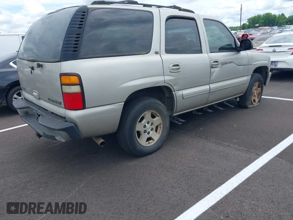 2004 Chevrolet Tahoe LS z VIN 1GNEC13Z84R140433, wystawiony jako IAAI lot #42352311 z przebiegiem Nie podano mil oraz . Historia ofert i sprzedaży dostępna na DreamBid. Obrazek 4.