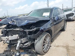 2022 Mercedes-Benz GLC 300 with VIN W1N0G8DBXNG074877, listed as a IAAI auction lot 42166865 with 56,503 mi miles and . Bid and sale history available at DreamBid. Image 2.