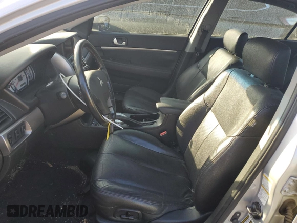2007 Mitsubishi Galant Ralliart z VIN 4A3AB76T67E053868, wystawiony jako Copart lot #82793264 z przebiegiem 159 001 mil mil oraz Szkoda całkowita • Salvage title. Historia ofert i sprzedaży dostępna na DreamBid. Obrazek 7.