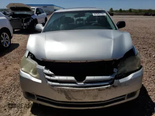 2007 Toyota Avalon XL z VIN 4T1BK36B77U194327, wystawiony jako Copart lot #57345135 z przebiegiem 189 484 mil mil oraz Szkoda całkowita • Salvage title. Historia ofert i sprzedaży dostępna na DreamBid. Obrazek 5.