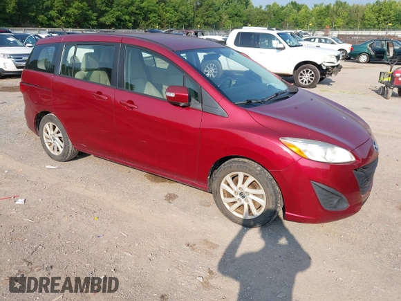 2014 Mazda 5 Sport with VIN JM1CW2BL6E0168411, listed as a IAAI auction lot 42414603 with 149,688 mi miles and . Bid and sale history available at DreamBid. Image 1.