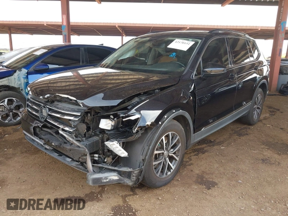 2018 Volkswagen Tiguan SEL z VIN 3VV3B7AX1JM036551, wystawiony jako IAAI lot #42170151 z przebiegiem 97 506 mil mil oraz . Historia ofert i sprzedaży dostępna na DreamBid. Obrazek 17.