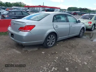2005 Toyota Avalon XL with VIN 4T1BK36B85U013619, listed as a IAAI auction lot 42209645 with 173,520 mi miles and . Bid and sale history available at carsss.com. Image 4.
