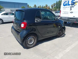 2016 Smart fortwo Passion with VIN WMEFJ5DA7GK068111, listed as a IAAI auction lot 42260953 with 87,115 mi miles and . Bid and sale history available at DreamBid. Image 4.