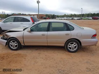 1997 Toyota Avalon XL with VIN 4T1BF12B1VU202935, listed as a IAAI auction lot 41900467 with 274,960 mi miles. Bid and sale history available at carsss.com. Image 14.