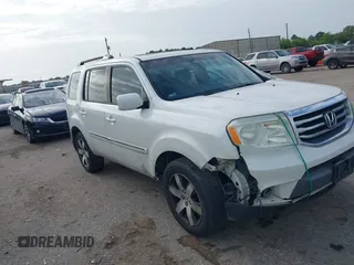 2013 Honda Pilot Touring with VIN 5FNYF3H95DB031130, listed as a IAAI auction lot 42669792 with 255,280 mi miles and . Bid and sale history available at DreamBid. Image 6.