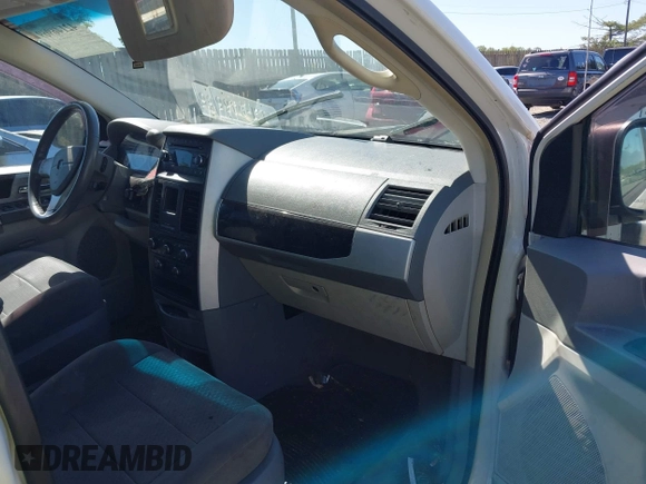 2010 Dodge Grand Caravan SXT with VIN 2D4RN5D12AR210330, listed as a IAAI auction lot 42146969 with 233,607 mi miles and . Bid and sale history available at DreamBid. Image 5.