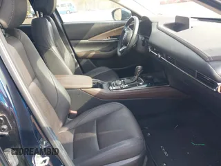 2021 Mazda CX-30 Premium with VIN 3MVDMBDM4MM238367, listed as a IAAI auction lot 42124335 with 31,120 mi miles and . Bid and sale history available at DreamBid. Image 5.