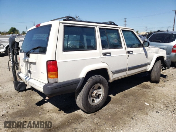 1999 Jeep Cherokee Sport with VIN 1J4FT68S9XL627003, listed as a Copart auction lot 49478595 with 320,444 mi miles and Salvage title. Bid and sale history available at DreamBid. Image 3.