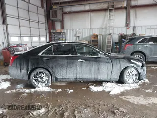 2016 Cadillac CTS Luxury Collection AWD with VIN 1G6AX5SX6G0111768, listed as a IAAI auction lot 41563991 with 76,718 mi miles and . Bid and sale history available at DreamBid. Image 13.
