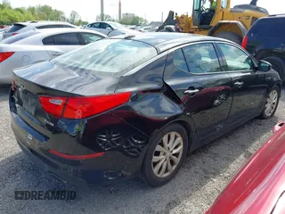2014 Kia Optima EX z VIN 5XXGN4A71EG340220, wystawiony jako IAAI lot #42176989 z przebiegiem 177 064 mil mil oraz . Historia ofert i sprzedaży dostępna na DreamBid. Obrazek 4.