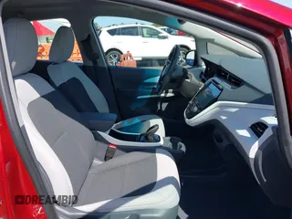 2019 Chevrolet Bolt EV LT z VIN 1G1FY6S02K4104254, wystawiony jako IAAI lot #42161627 z przebiegiem 41 363 mil mil oraz . Historia ofert i sprzedaży dostępna na DreamBid. Obrazek 5.