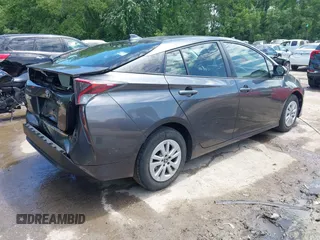 2016 Toyota Prius Two z VIN JTDKBRFU2G3014010, wystawiony jako IAAI lot #42254617 z przebiegiem 171 521 mil mil oraz . Historia ofert i sprzedaży dostępna na DreamBid. Obrazek 4.