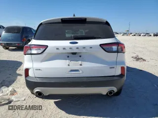 2021 Ford Escape SEL Hybrid z VIN 1FMCU0CZ5MUA52570, wystawiony jako Copart lot #42097635 z przebiegiem 105 059 mil mil oraz Czysty tytuł • Clean title. Historia ofert i sprzedaży dostępna na DreamBid. Obrazek 6.