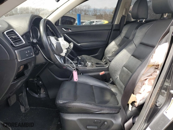 2016 Mazda CX-5 Grand Touring with VIN JM3KE4DY4G0671531, listed as a Copart auction lot 49586545 with 0 mi miles and Salvage Title. Bid and sale history available at carsss.com. Image 7.