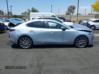 2020 Mazda 3 Select with VIN 3MZBPACL1LM131999, listed as a IAAI auction lot 42433532 with 23,067 mi miles and . Bid and sale history available at DreamBid. Image 14.