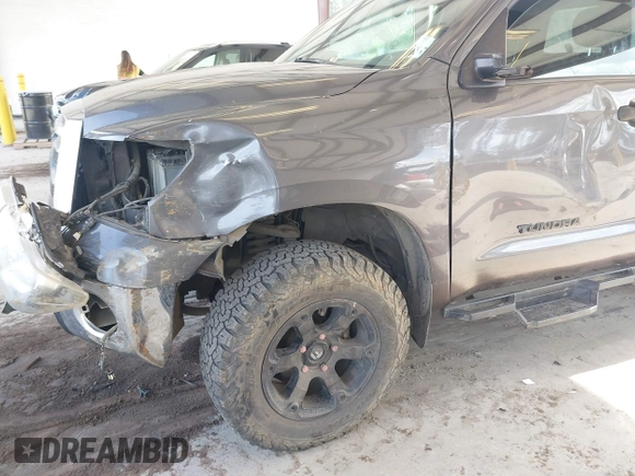 2012 Toyota Tundra with VIN 5TFUY5F13CX259312, listed as a IAAI auction lot 42547918 with 182,190 mi miles and . Bid and sale history available at DreamBid. Image 6.
