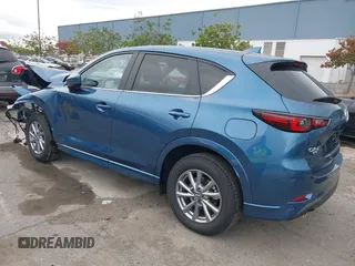 2024 Mazda CX-5 S Carbon Edition z VIN JM3KFBCL2R0454425, wystawiony jako IAAI lot #40934280 z przebiegiem 4 094 mil mil oraz . Historia ofert i sprzedaży dostępna na DreamBid. Obrazek 3.