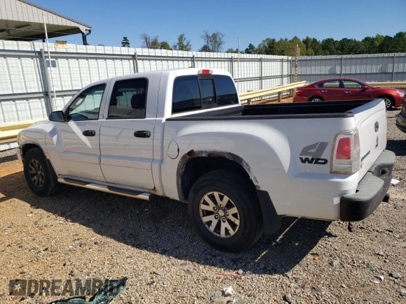 2007 Mitsubishi Raider LS z VIN 1Z7HT28K57S234309, wystawiony jako Copart lot #75505104 z przebiegiem 210 964 mil mil oraz Szkoda całkowita • Salvage title. Historia ofert i sprzedaży dostępna na DreamBid. Obrazek 2.