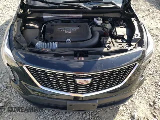 2023 Cadillac XT4 AWD Luxury with VIN 1GYFZBR49PF101377, listed as a Copart auction lot 73961294 with 26,847 mi miles and Salvage Title. Bid and sale history available at carsss.com. Image 14.