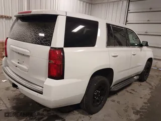2018 Chevrolet Tahoe Commercial with VIN 1GNSKDEC1JR240868, listed as a IAAI auction lot 41608806 with 138,126 mi miles. Bid and sale history available at carsss.com. Image 4.