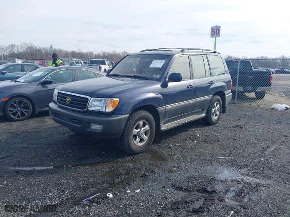 2002 Toyota Land Cruiser with VIN JTEHT05J122018974, listed as a IAAI auction lot 41543290 with 266,926 mi miles. Bid and sale history available at carsss.com. Image 2.