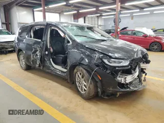 2023 Chrysler Pacifica Touring L with VIN 2C4RC1BG3PR582271, listed as a Copart auction lot 51644595 with 57,930 mi miles and Salvage title. Bid and sale history available at DreamBid. Image 4.