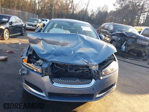 2013 Jaguar XF I4 RWD with VIN SAJWA0ES4DPS95992, listed as a IAAI auction lot 41248969 with 56,024 mi miles. Bid and sale history available at carsss.com. Image 12.