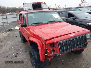 1996 Jeep Cherokee Sport with VIN 1J4FJ68S6TL299152, listed as a IAAI auction lot 41004736 with 277,819 mi miles. Bid and sale history available at carsss.com. Image 6.