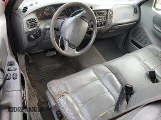 2001 Ford F-150 XL with VIN 1FTRX18L21NA50586, listed as a Copart auction lot 84245554 with 0 mi miles and Salvage Title. Bid and sale history available at carsss.com. Image 8.