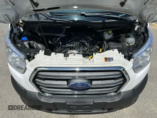 2020 Ford Transit Cargo z VIN 1FTBR1CG3LKB36452, wystawiony jako Copart lot #58659545 z przebiegiem 171 504 mil mil oraz Tytuł czysty. Historia ofert i sprzedaży dostępna na DreamBid. Obrazek 5.