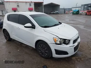 2014 Chevrolet Sonic LS with VIN 1G1JA6SH0E4100325, listed as a IAAI auction lot 41389143 with 109,102 mi miles and . Bid and sale history available at DreamBid. Image 1.