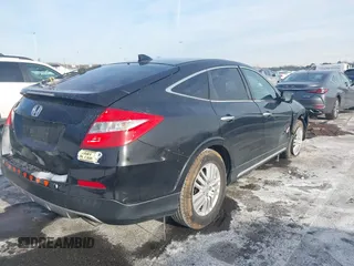 2013 Honda Crosstour EX-L z VIN 5J6TF3H59DL001546, wystawiony jako IAAI lot #41396790 z przebiegiem 168 255 mil mil oraz . Historia ofert i sprzedaży dostępna na DreamBid. Obrazek 4.