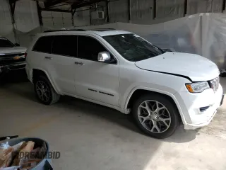 2020 Jeep Grand Cherokee High Altitude with VIN 1C4RJFCG3LC137954, listed as a Copart auction lot 54392495 with 109,493 mi miles and Salvage title. Bid and sale history available at DreamBid. Image 4.