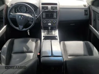 2015 Mazda CX-9 Grand Touring z VIN JM3TB3DA6F0460842, wystawiony jako Copart lot #52630325 z przebiegiem 21 666 mil mil oraz Szkoda całkowita • Salvage title. Historia ofert i sprzedaży dostępna na DreamBid. Obrazek 8.
