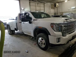 2020 GMC Sierra 3500HD Denali z VIN 1GT49WEY5LF265507, wystawiony jako Copart lot #53607974 z przebiegiem 62 955 mil mil oraz Szkody całkowita. Historia ofert i sprzedaży dostępna na DreamBid. Obrazek 4.