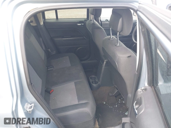 2013 Jeep Patriot Sport with VIN 1C4NJPBA6DD272701, listed as a IAAI auction lot 42014123 with 190,509 mi miles. Bid and sale history available at carsss.com. Image 8.