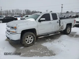 2018 Chevrolet Silverado 1500 LT with VIN 1GCVKREH8JZ280721, listed as a Copart auction lot 45921135 with 74,684 mi miles and Salvage Title. Bid and sale history available at DreamBid. Image 1.