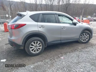 2013 Mazda CX-5 Touring with VIN JM3KE2CE9D0133348, listed as a IAAI auction lot 41357592 with 122,227 mi miles. Bid and sale history available at carsss.com. Image 4.