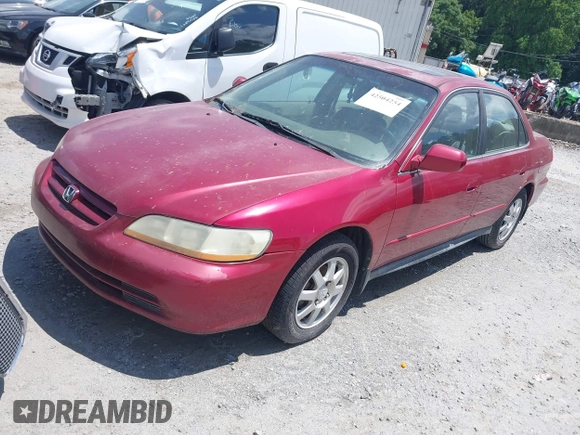 2002 Honda Accord SE z VIN 1HGCG56712A020105, wystawiony jako IAAI lot #42504254 z przebiegiem 317 533 mil mil oraz . Historia ofert i sprzedaży dostępna na DreamBid. Obrazek 2.