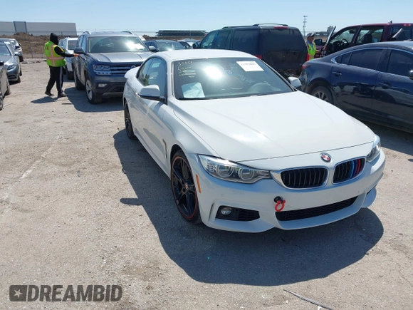 2015 BMW 4 Series 428i z VIN WBA3V7C52FP771779, wystawiony jako IAAI lot #41953647 z przebiegiem 66 003 mil mil oraz . Historia ofert i sprzedaży dostępna na DreamBid. Obrazek 1.
