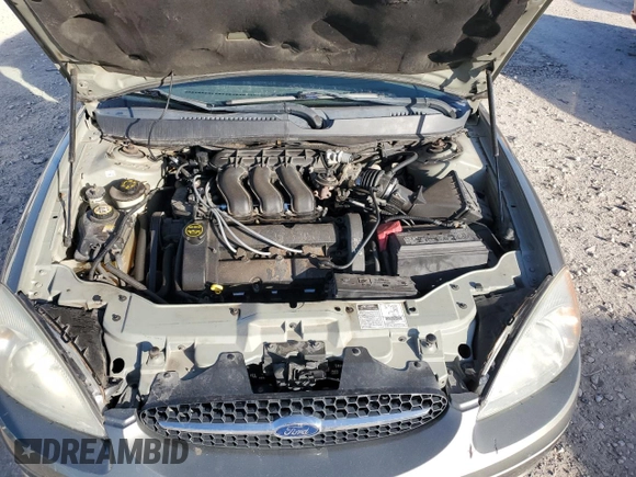2002 Ford Taurus z VIN 1FAHP59S82A188995, wystawiony jako Copart lot #82141704 z przebiegiem 89 153 mil mil oraz Szkody całkowita. Historia ofert i sprzedaży dostępna na DreamBid. Obrazek 11.