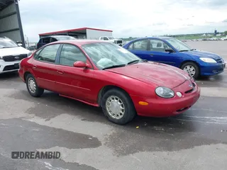 1996 Ford Taurus LX with VIN 1FALP53S2TA221249, listed as a IAAI auction lot 42506786 with 198,272 mi miles and . Bid and sale history available at DreamBid. Image 1.