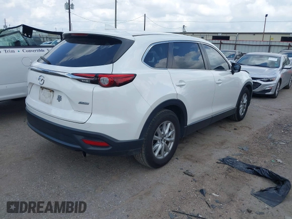 2016 Mazda CX-9 Sport z VIN JM3TCABY1G0111316, wystawiony jako IAAI lot #42085945 z przebiegiem 98 691 mil mil oraz . Historia ofert i sprzedaży dostępna na DreamBid. Obrazek 4.