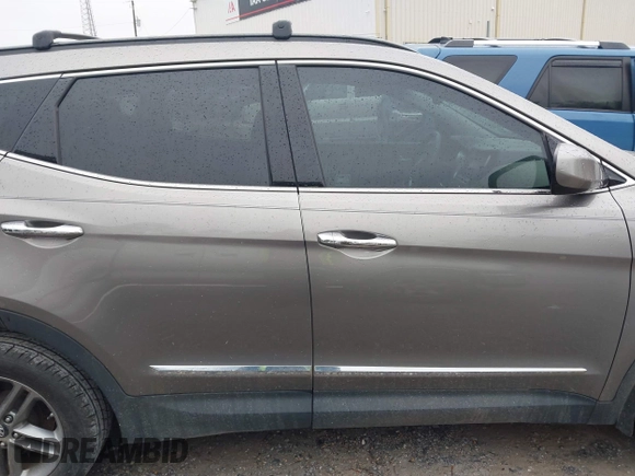 2017 Hyundai Santa Fe 2.4L z VIN 5XYZU3LB8HG421397, wystawiony jako IAAI lot #41961915 z przebiegiem 102 594 mil mil oraz . Historia ofert i sprzedaży dostępna na DreamBid. Obrazek 13.