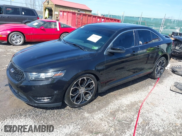 2013 Ford Taurus SHO z VIN 1FAHP2KT9DG164190, wystawiony jako IAAI lot #41743345 z przebiegiem 191 568 mil mil oraz . Historia ofert i sprzedaży dostępna na DreamBid. Obrazek 2.