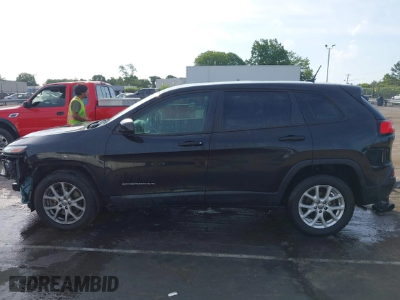 2014 Jeep Cherokee Sport with VIN 1C4PJLAB1EW221415, listed as a IAAI auction lot 42170364 with 182,813 mi miles and . Bid and sale history available at DreamBid. Image 15.