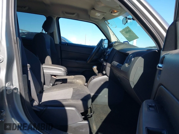 2015 Jeep Patriot Sport with VIN 1C4NJPBA8FD325398, listed as a IAAI auction lot 40696837 with 136,130 mi miles. Bid and sale history available at carsss.com. Image 5.