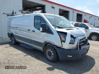 2020 Ford Transit Cargo z VIN 1FTYE1Y80LKB53684, wystawiony jako IAAI lot #42556377 z przebiegiem 102 801 mil mil oraz . Historia ofert i sprzedaży dostępna na DreamBid. Obrazek 1.